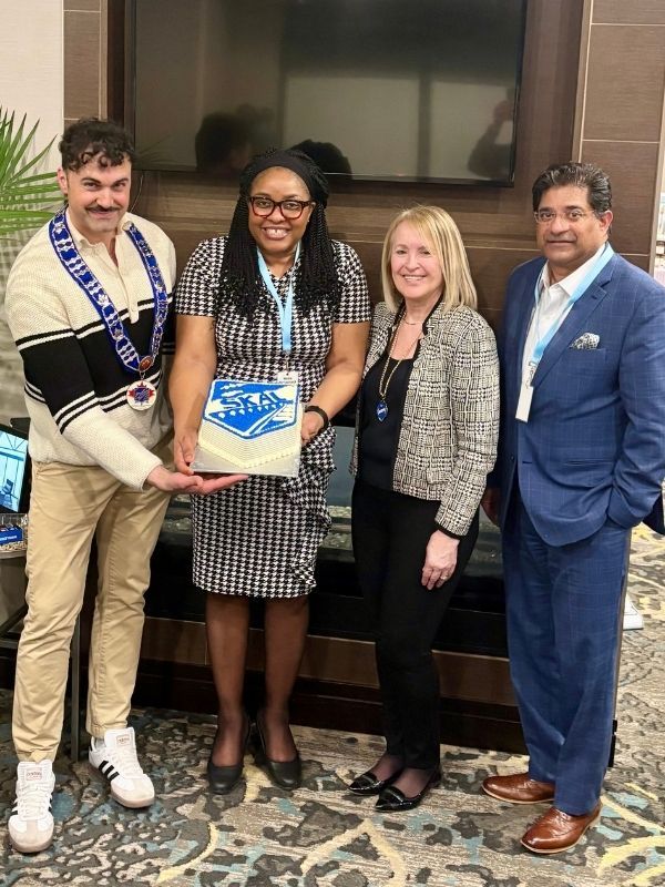Executive Board. From left to right: Luca Monti, Nadia McCormack-McIntyre (Vice Ppresident), Georgia Raso (Exec Secretary), George Thomas (Treasurer).